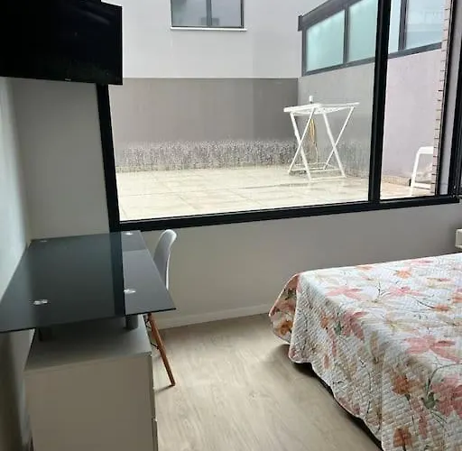 Acolhedor Em شقة *